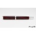 Stunning red abalone on a rollerball pen handcrafted with rhodium accents